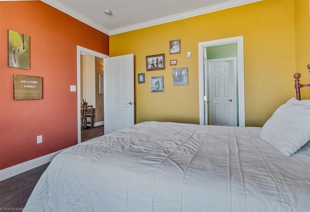 bedroom featuring carpet flooring, baseboards, and ornamental molding