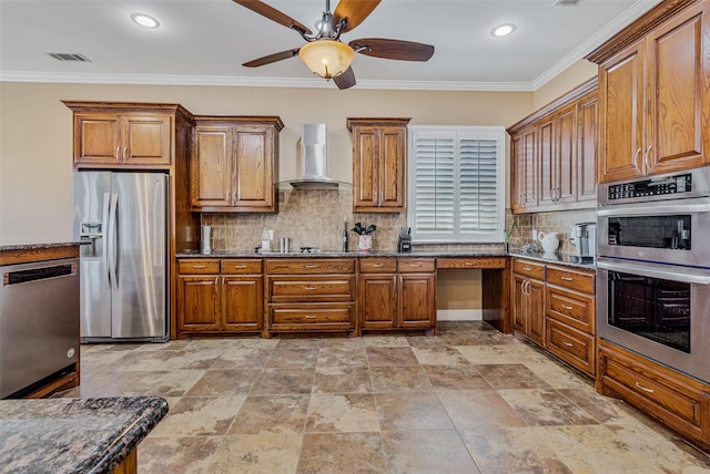 kitchen with stainless steel appliances, visible vents, brown cabinetry, and wall chimney range hood