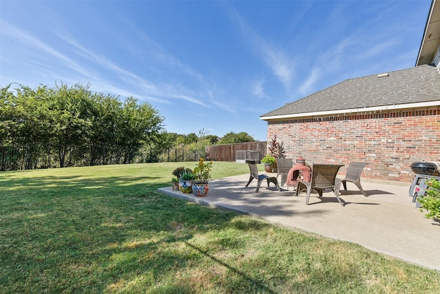 view of yard with a patio area and fence