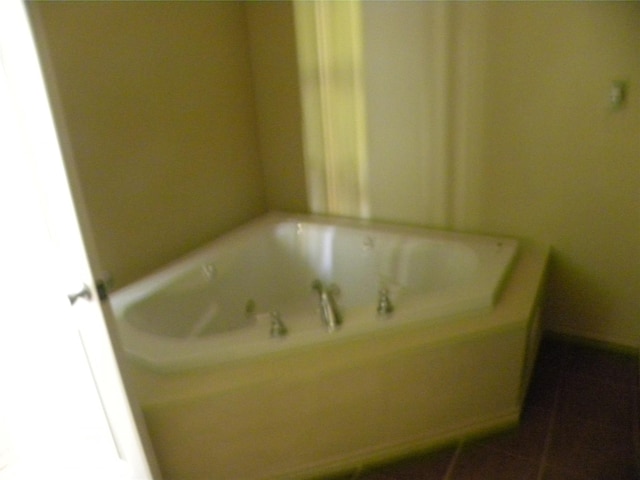 bathroom featuring a jetted tub