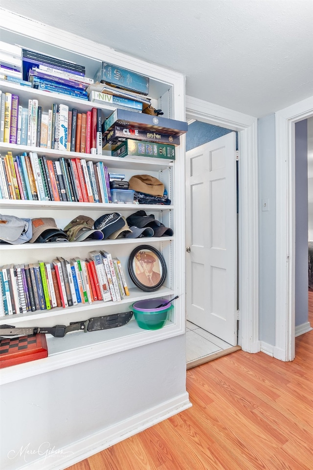 details with baseboards and wood finished floors