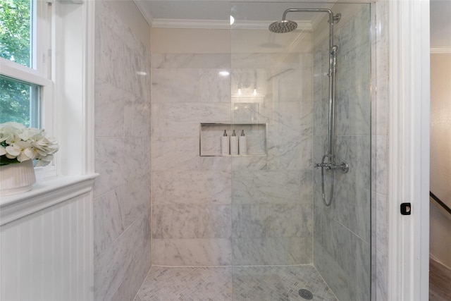 full bathroom with a stall shower and ornamental molding