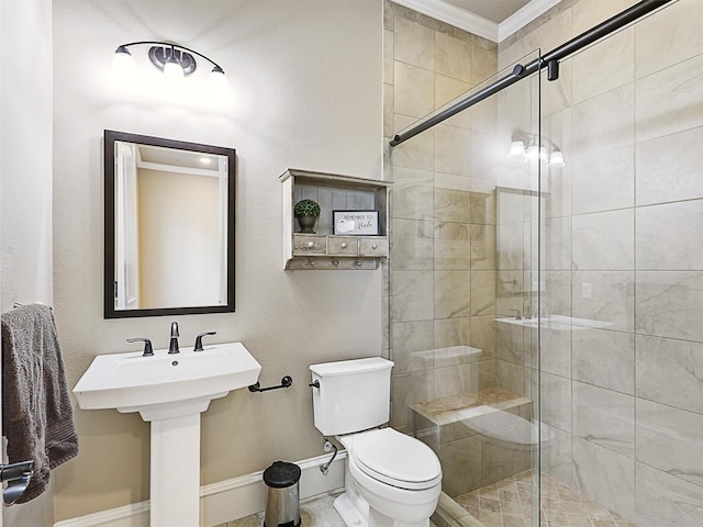 full bath with a stall shower, toilet, baseboards, and ornamental molding