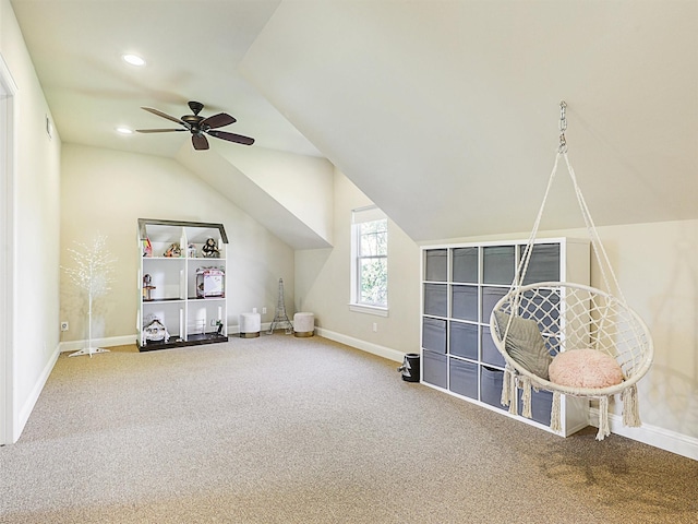 interior space with recessed lighting, baseboards, lofted ceiling, and carpet floors