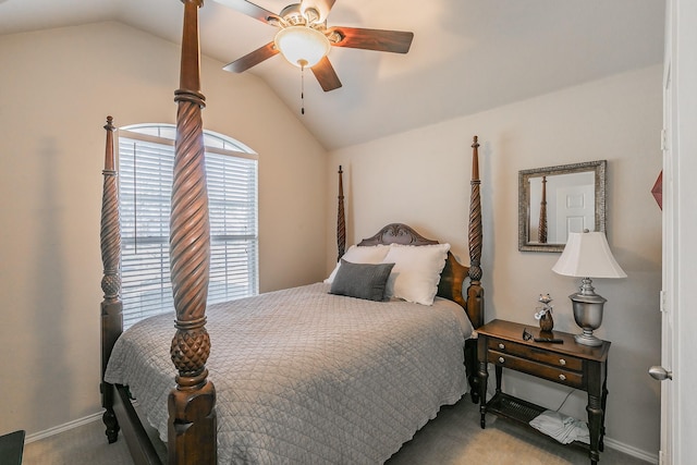 carpeted bedroom featuring ceiling fan, baseboards, and lofted ceiling