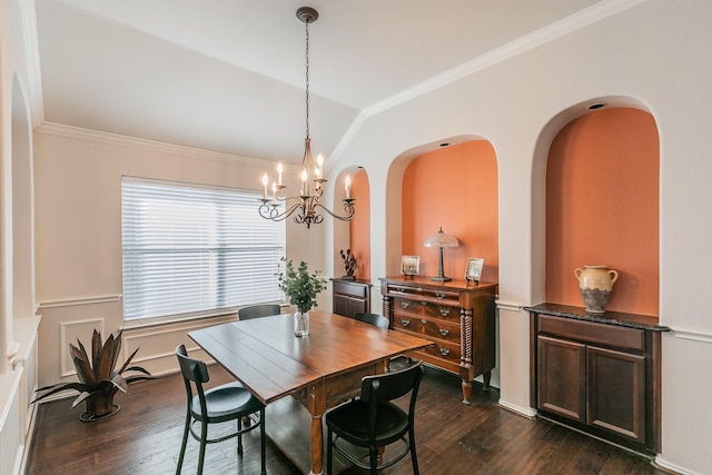 dining space with lofted ceiling, dark wood-style flooring, and ornamental molding