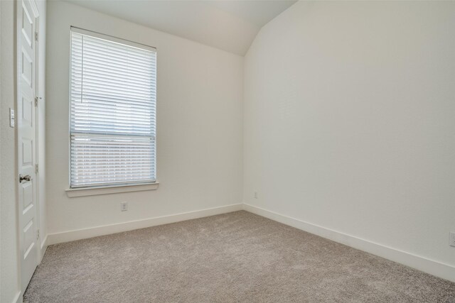 1913 Recioto Dr, Mclendon Chisholm, TX 75032 - empty room with carpet floors, vaulted ceiling, and baseboards