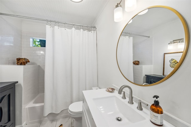 full bathroom featuring vanity, toilet, crown molding, and shower / bathtub combination with curtain