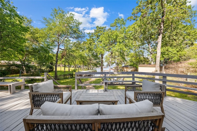 wooden terrace with outdoor lounge area