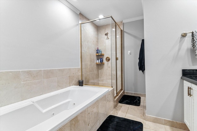 full bathroom featuring a stall shower, crown molding, baseboards, and a whirlpool tub