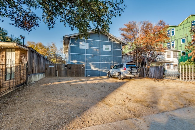 garage with fence