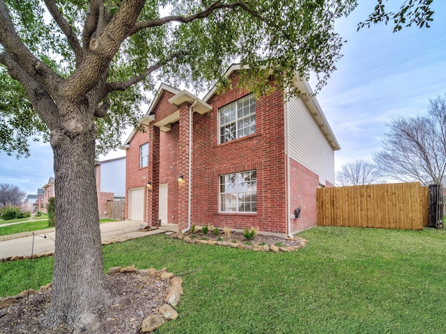 view of front facade featuring fence, concrete driveway, a front lawn, a garage, and brick siding