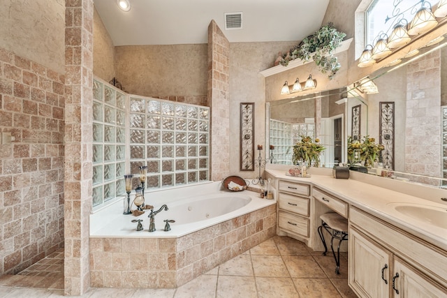 full bath featuring visible vents, a jetted tub, vanity, and a walk in shower