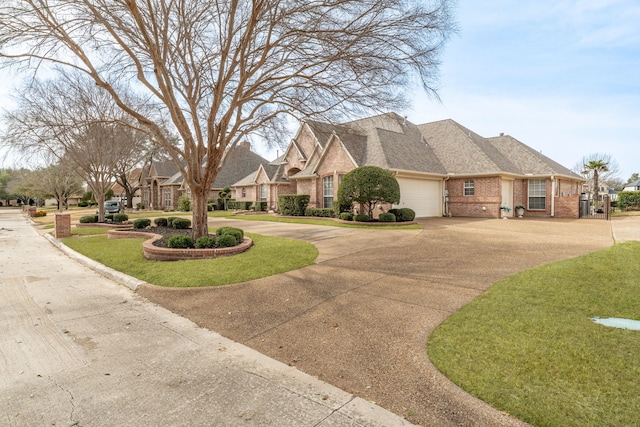 exterior space with driveway, roof with shingles, an attached garage, a front lawn, and brick siding