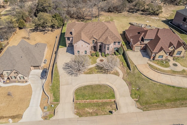 birds eye view of property with a residential view