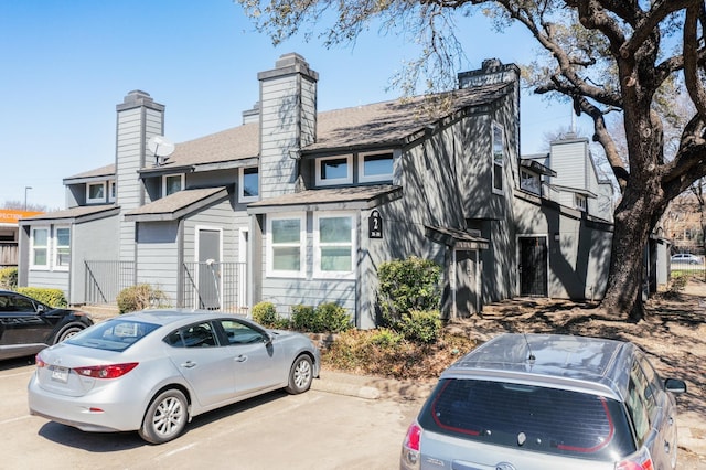 view of front of house featuring uncovered parking