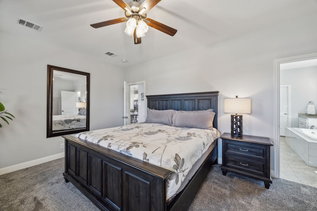 bedroom featuring visible vents, baseboards, and carpet