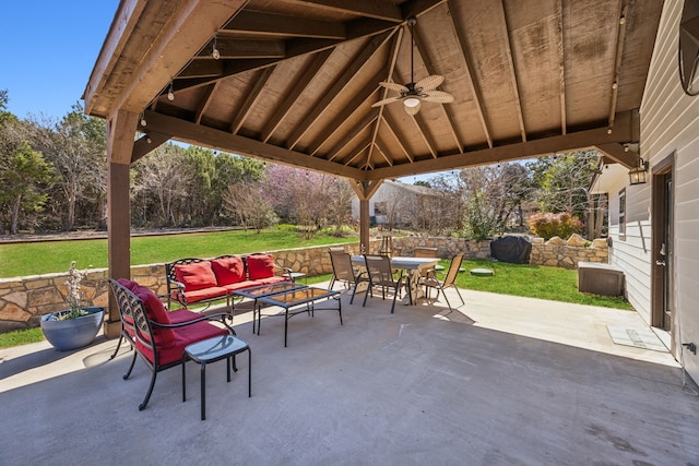 view of patio / terrace with a gazebo, a ceiling fan, outdoor dining space, and outdoor lounge area