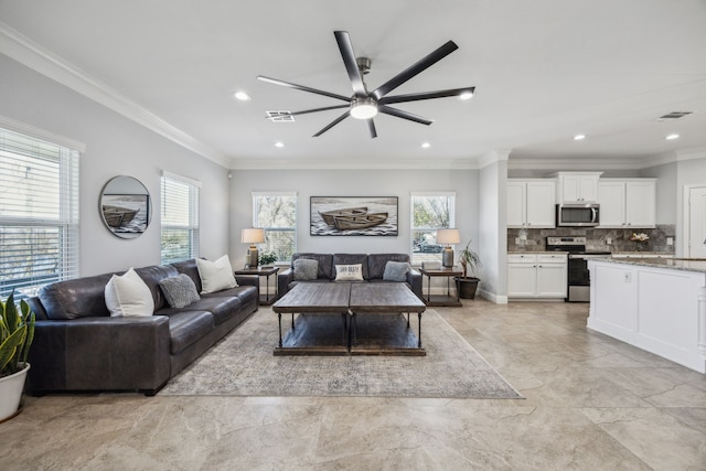 living area with visible vents, recessed lighting, a ceiling fan, and ornamental molding