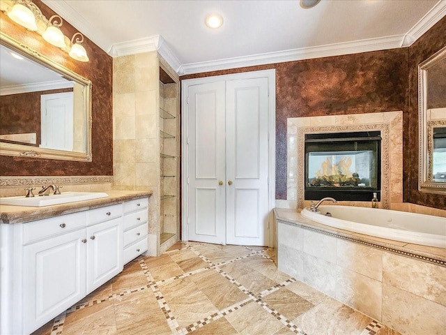 bathroom featuring vanity, crown molding, and a garden tub