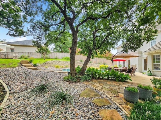 view of yard with a patio area and fence private yard