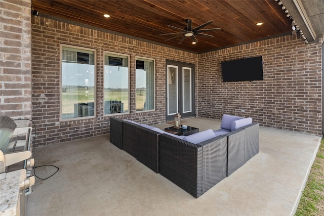 view of patio / terrace featuring an outdoor living space and ceiling fan