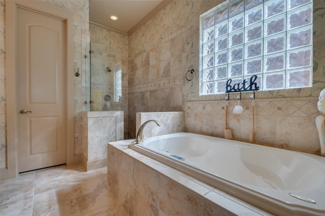 full bathroom with a garden tub, walk in shower, and ornamental molding