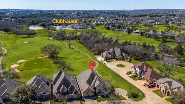 birds eye view of property featuring a residential view and view of golf course