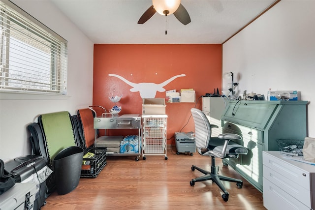 home office with wood finished floors and ceiling fan