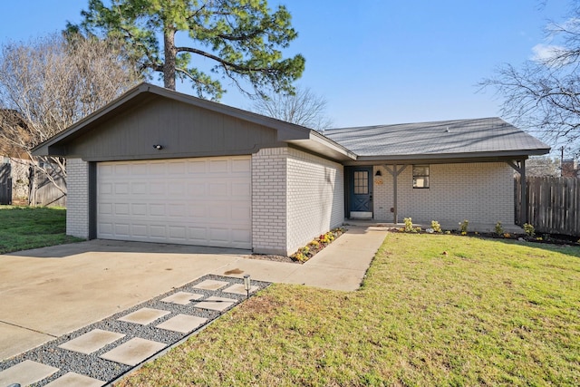 ranch-style home featuring a front yard, an attached garage, fence, and brick siding