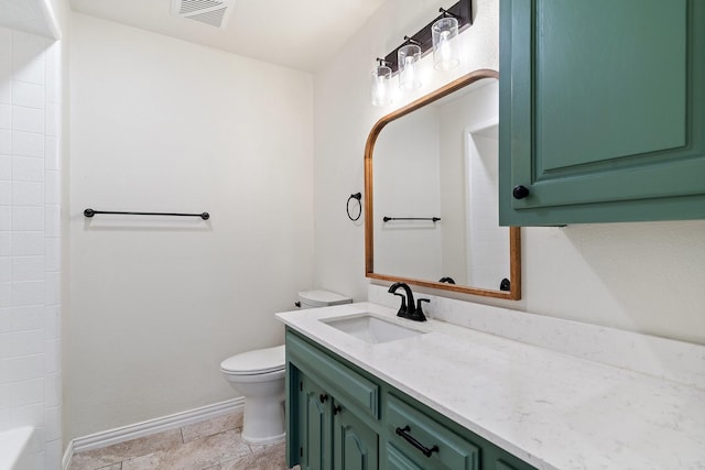 bathroom featuring visible vents, toilet, vanity, and baseboards