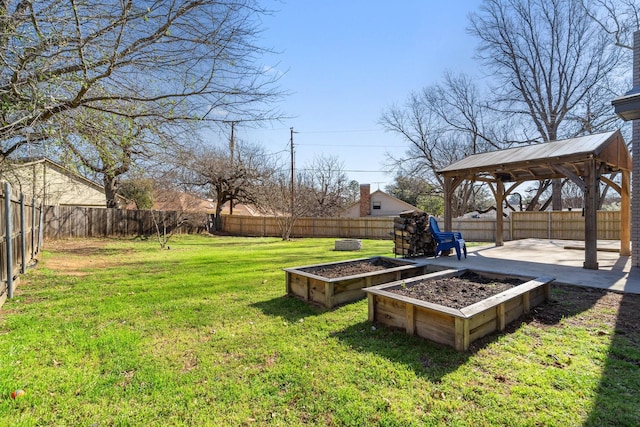 view of yard with a gazebo, a fenced backyard, and a patio