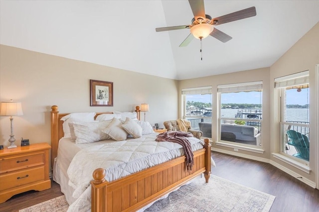 bedroom featuring lofted ceiling, wood finished floors, and a ceiling fan