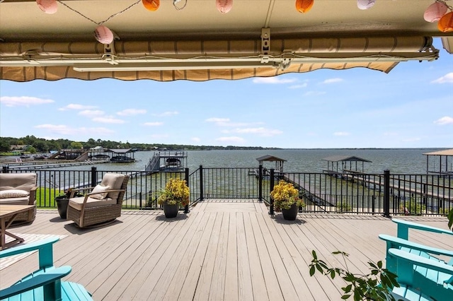 deck featuring a water view