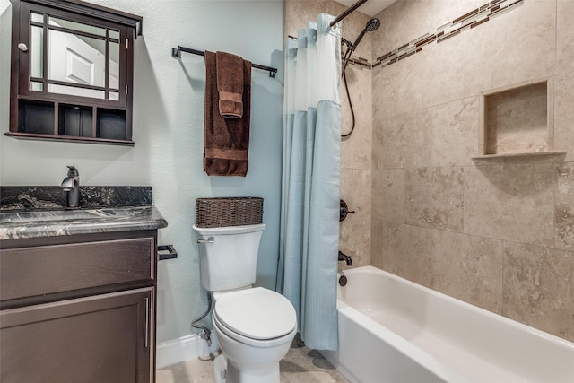 full bathroom with toilet, vanity, baseboards, and shower / bath combo