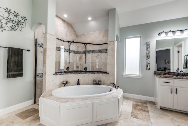 bathroom featuring vanity, baseboards, tiled shower, lofted ceiling, and a bath