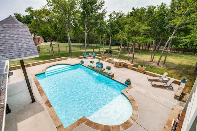 view of pool with a fenced in pool, a patio, a lawn, and a fenced backyard