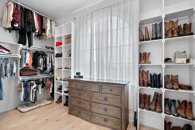 spacious closet with wood finished floors