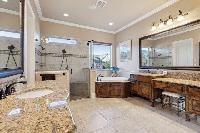 full bathroom featuring visible vents, ornamental molding, a stall shower, and a sink