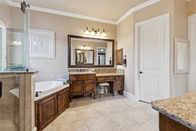 bathroom with tile patterned floors, a garden tub, ornamental molding, and vanity