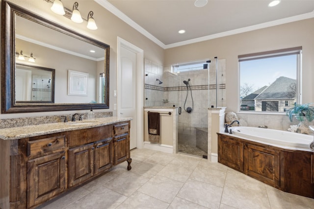 bathroom featuring vanity, recessed lighting, ornamental molding, a shower stall, and a garden tub