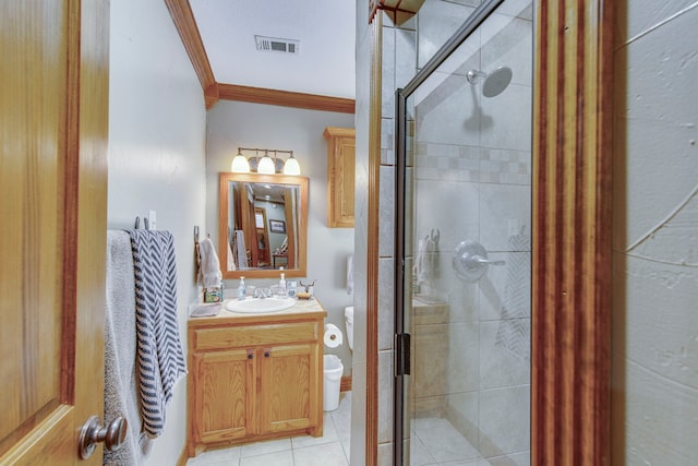 full bathroom featuring visible vents, a shower stall, crown molding, toilet, and vanity