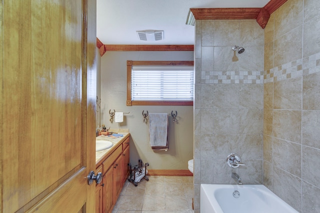 full bath with vanity, baseboards, visible vents, shower / washtub combination, and toilet