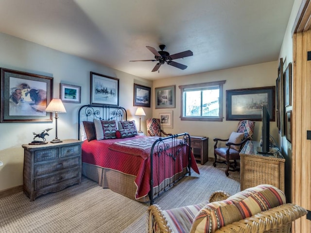 bedroom featuring baseboards, carpet floors, and ceiling fan