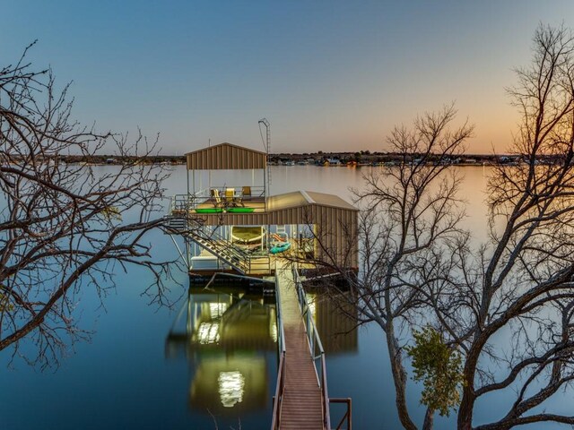 dock area with a water view