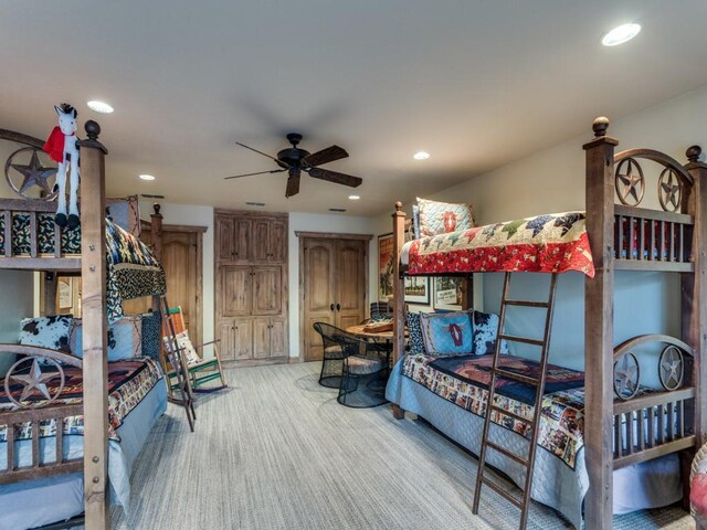 bedroom with recessed lighting and light colored carpet