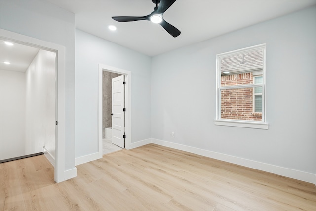 spare room featuring recessed lighting, baseboards, wood finished floors, and a ceiling fan