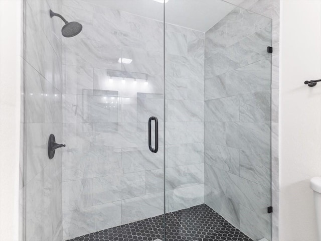 bathroom with a stall shower