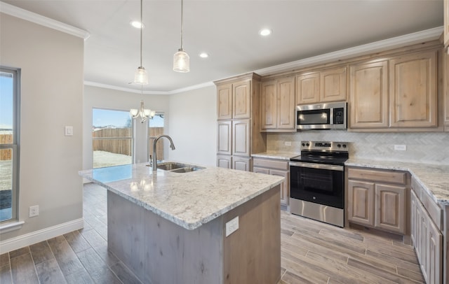 kitchen featuring light brown cabinets, ornamental molding, a sink, appliances with stainless steel finishes, and backsplash