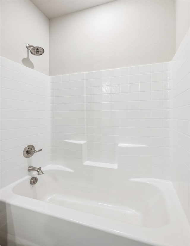 bathroom with shower / tub combination